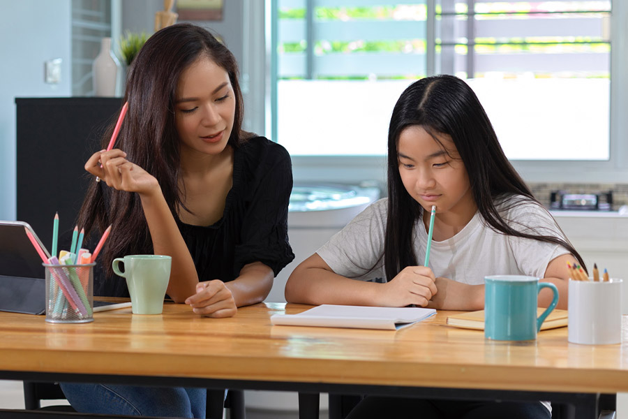 student and tutor together at a desk in Kissimmee